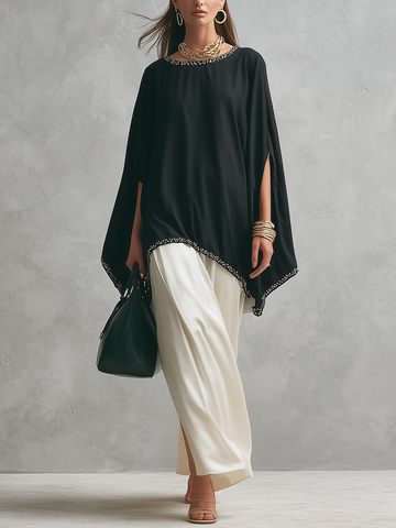 Conjunto Minimalista de Blusa Estilo Capa Preta e Saia Fluida