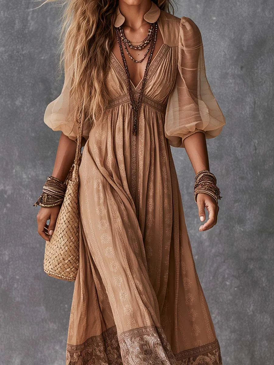 Robe longue bohème à décolleté en V profond, manches évêque et imprimé en bordure