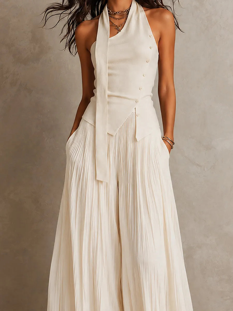 Ensemble haut chic asymétrique à encolure dos-nu et pantalon large en mousseline froissée