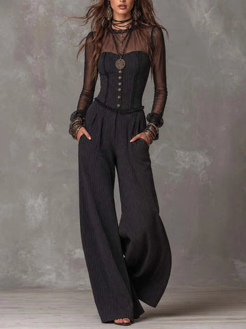 Combinaison tissée à fines rayures à larges jambes avec poches, corset sans bretelles à col montant et manches transparentes en maille boutonnées