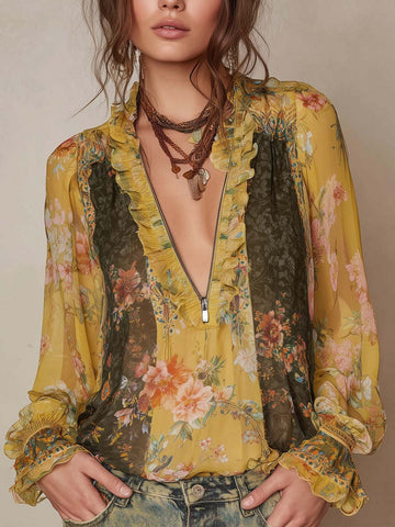 Camicetta in chiffon floreale con ruches e zip frontale