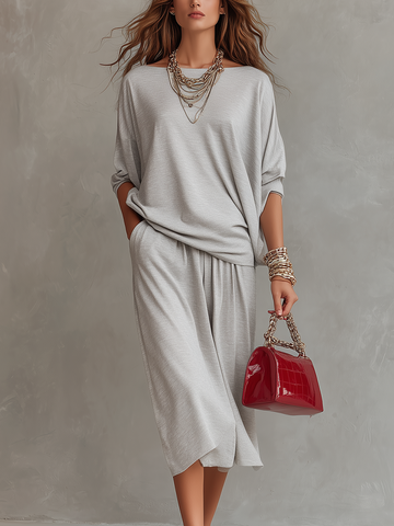 Conjunto de blusa e saia midi minimalista e despojado