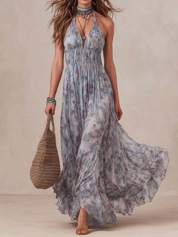 Vestido longo floral rodado com elástico e decote halter boêmio