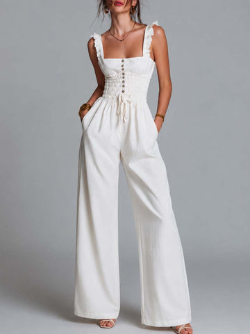 Tuta intera a gamba larga arricciata in misto cotone bianco con spalline arricciate e smock