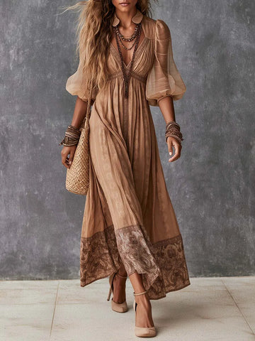 Vestido longo estampado com decote V profundo e manga bufante no estilo boho