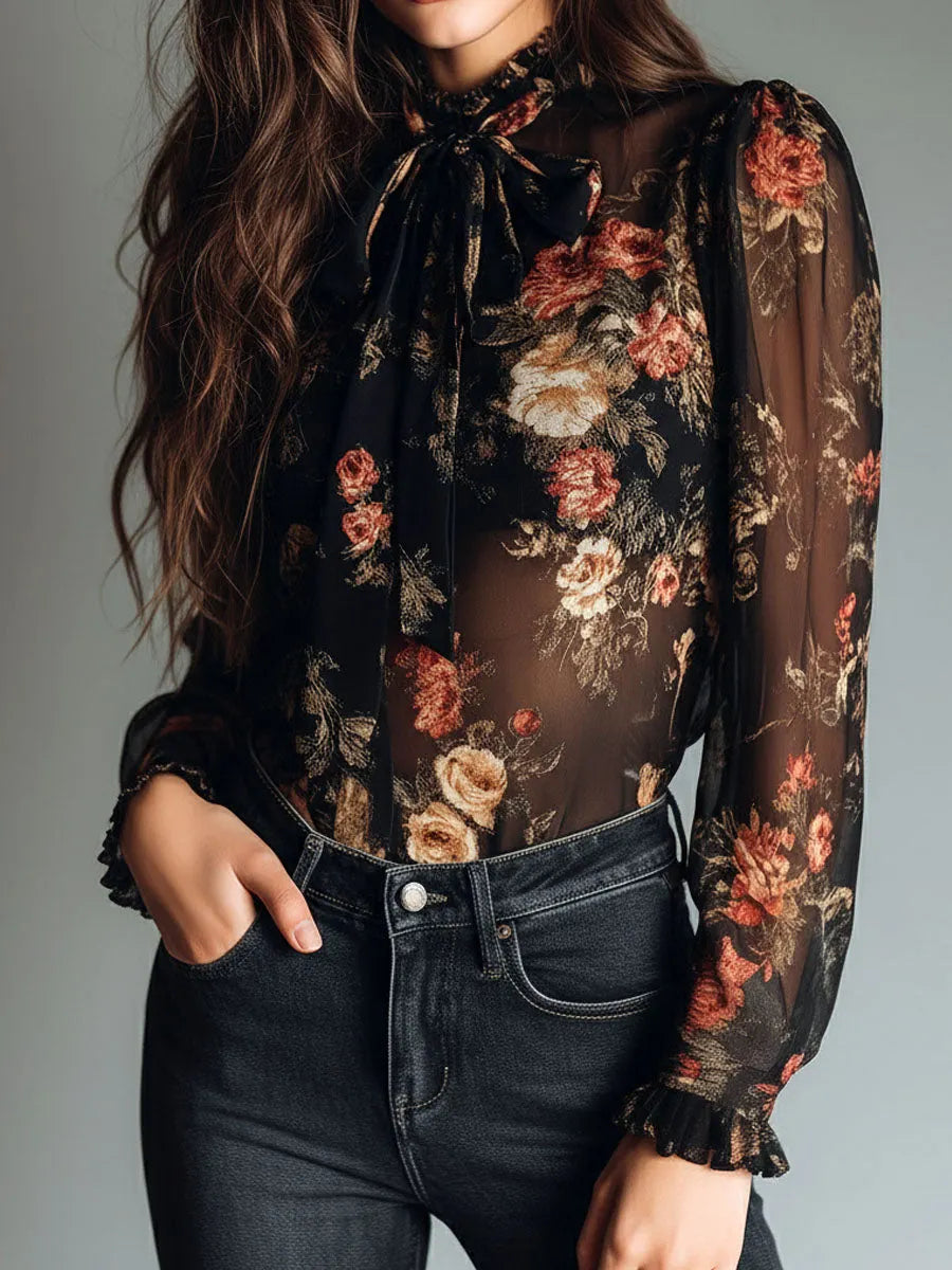 Camicetta vintage nera in chiffon trasparente floreale con fiocco sul collo