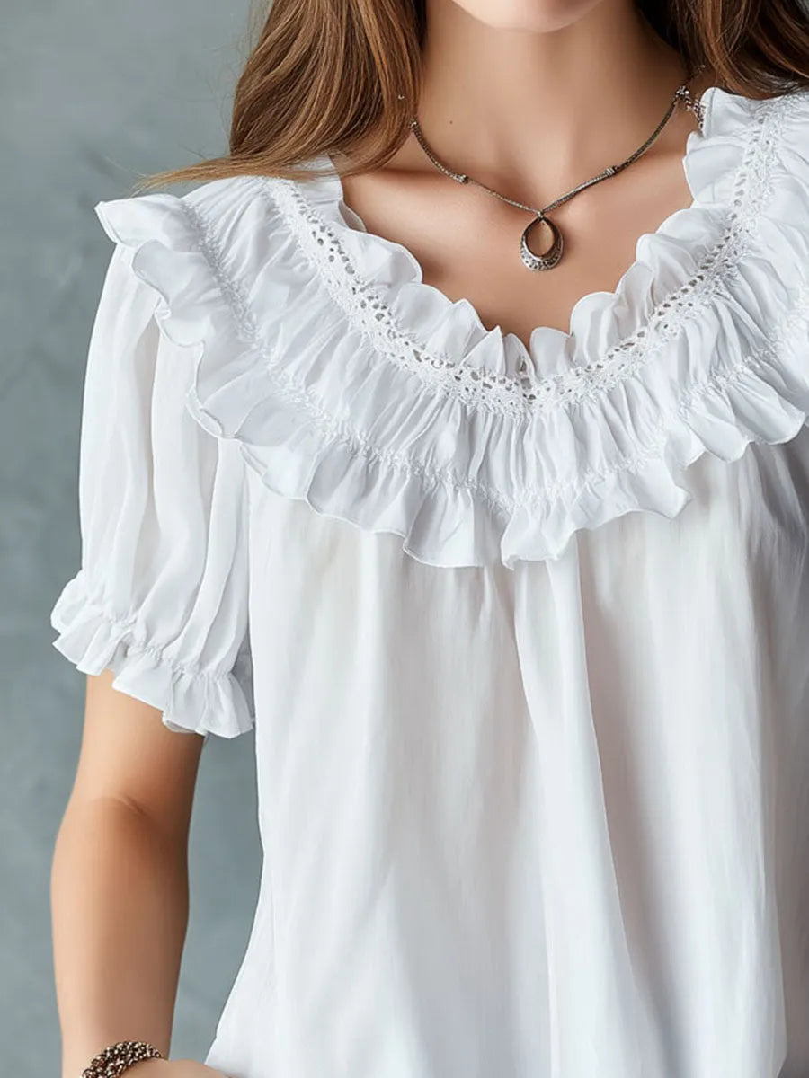 Camicetta Boho bianca con maniche a sbuffo, volant e pizzo