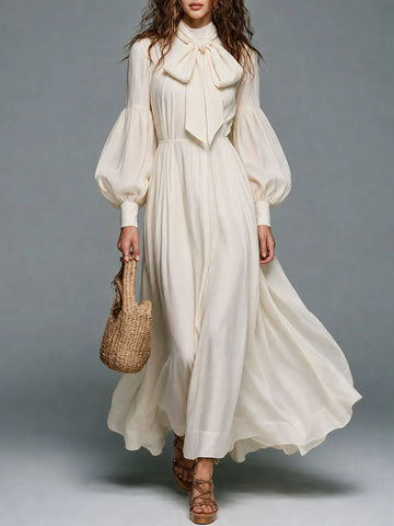 Vestido longo com gola laço e mangas bispo