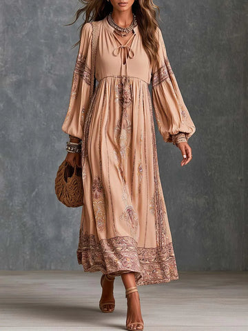Vestido Midi Boho com Estampa Paisley na Barra, Gola Laço e Manga Bufante