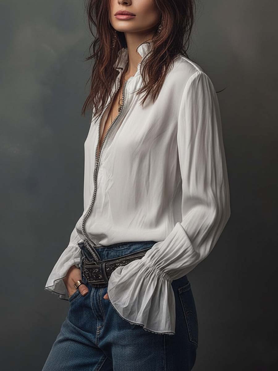 Camicia bianca con zip e polsini a balze
