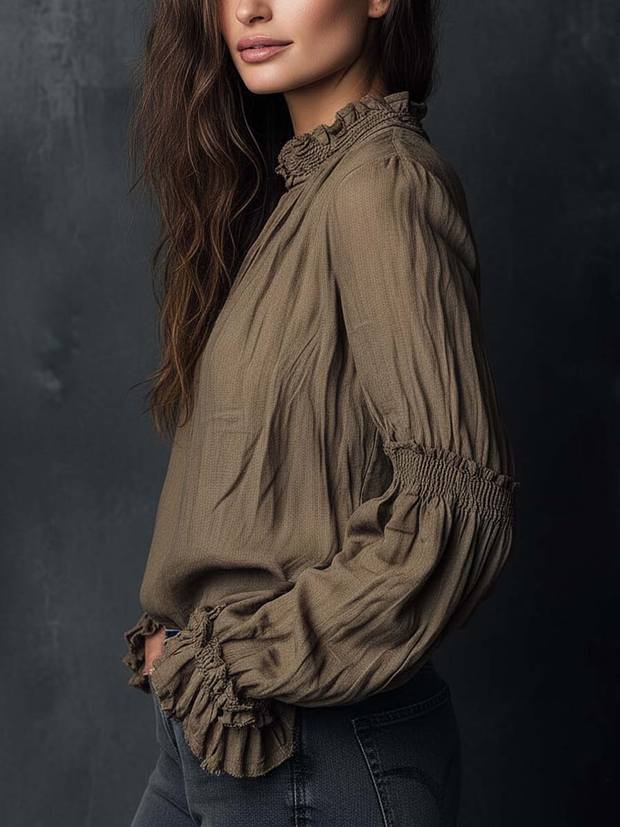 Camicetta con mezza zip e polsini arricciati stile boho