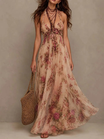 Robe longue en mousseline fluide à imprimé floral, dos nu et taille froncée en V profond