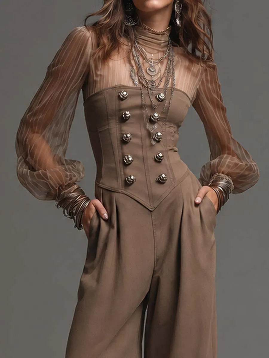 Combinaison en maille transparente à rayures verticales col roulé à manches bouffantes, corset, poches boutonnées et jambes larges